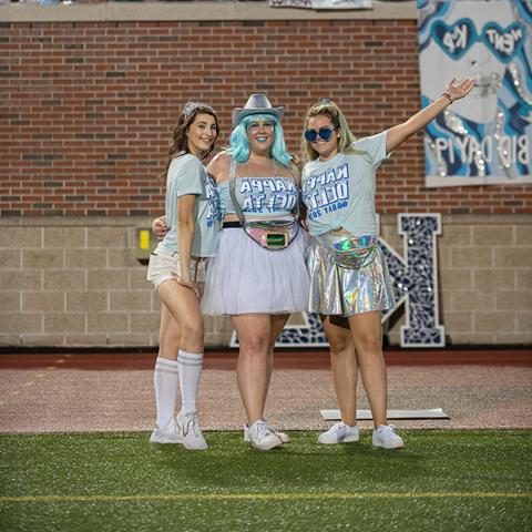 3 Kappa Delta women posing during Bid Night