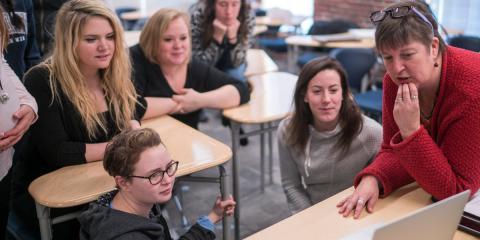 teachers and students in a classroom