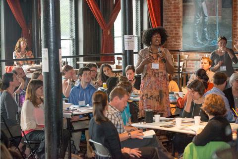 woman talking to audience